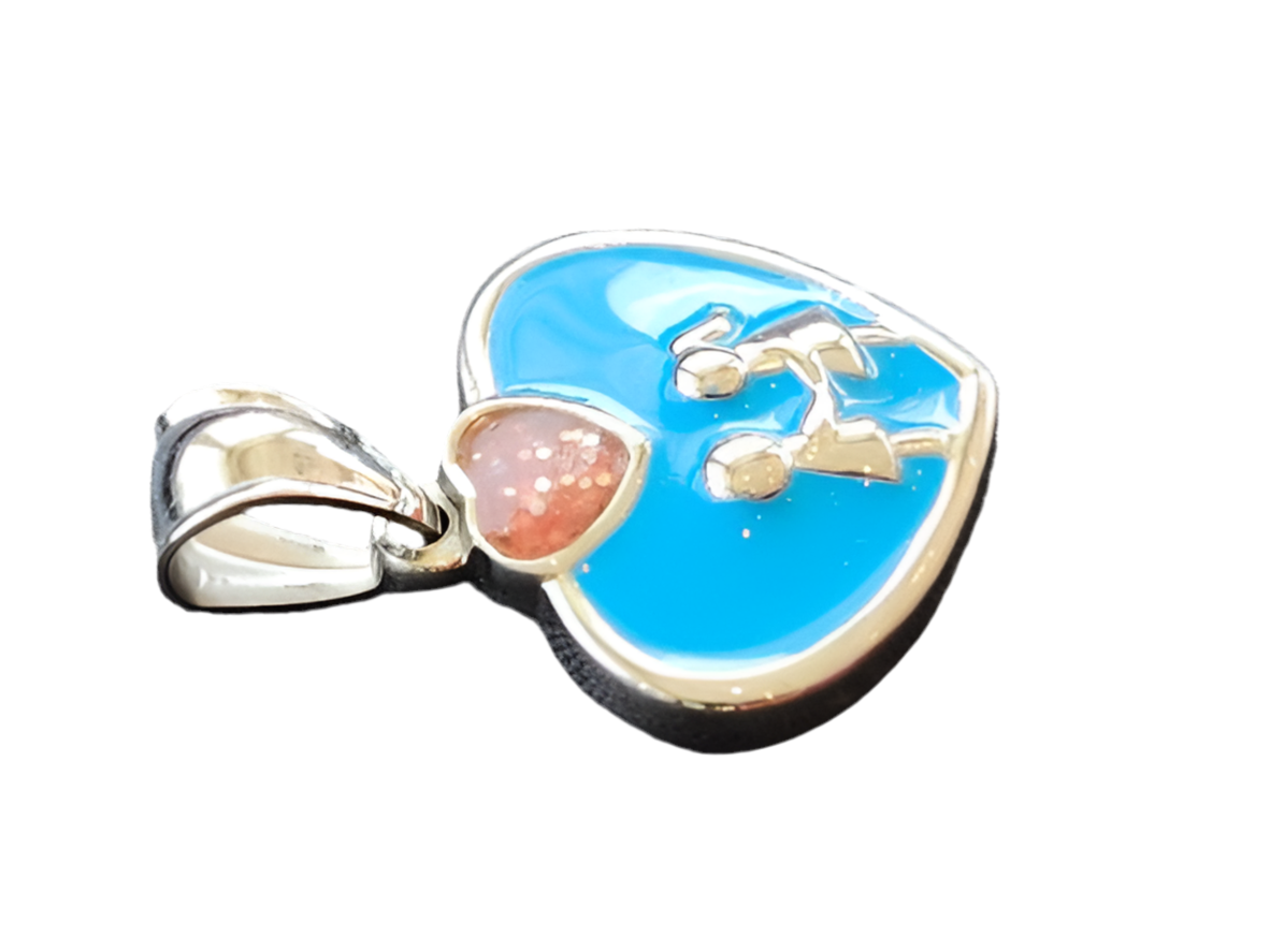 A heart-shaped pendant with a vibrant blue enamel