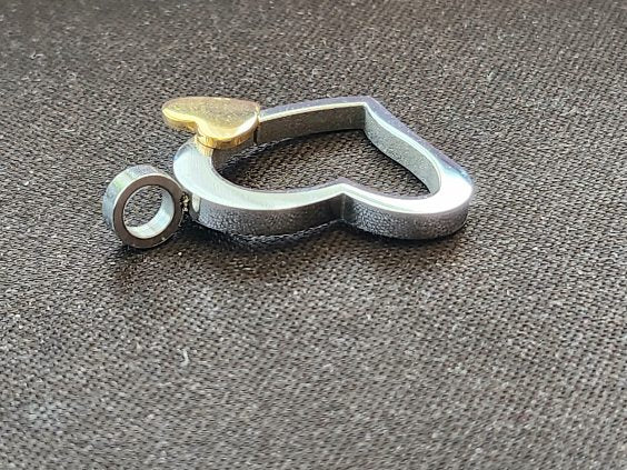 Open-heart pendant in polished stainless stee