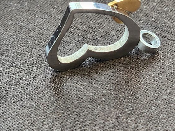 Open-heart pendant in polished stainless stee